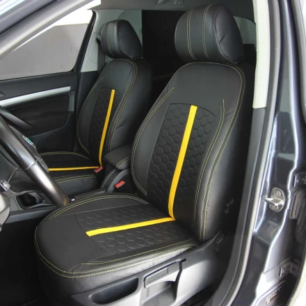 Чехлы на Skoda Octavia A5 (Шкода Октавия А5) из экокожи ES черные с желтой полосой