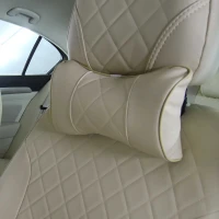 Подушка на подголовник из экокожи бежевая EMC с прострочкой ромб