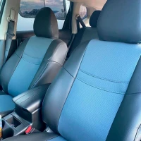 Чехлы на Nissan Rogue T32 из экокожи c перфорацией черно-серые