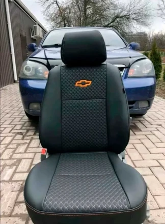 Чехлы на Chevrolet Lacetti из экокожи и тисненого гобелена
