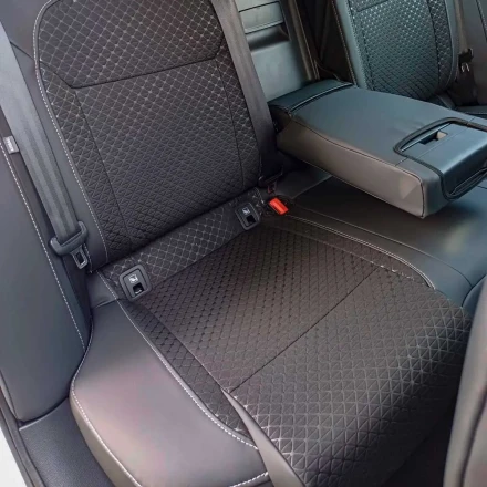 Чехлы на Skoda SuperB III (Шкода Суперб) из экокожи и ткани с тиснением