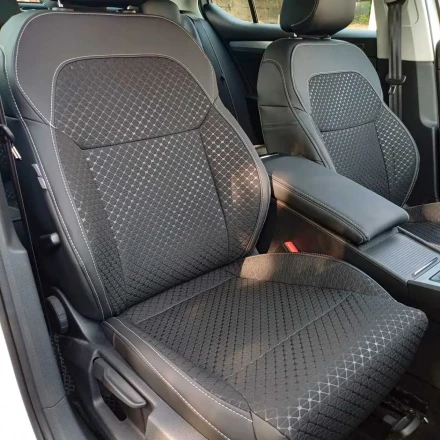 Чехлы на Skoda SuperB III (Шкода Суперб) из экокожи и ткани с тиснением