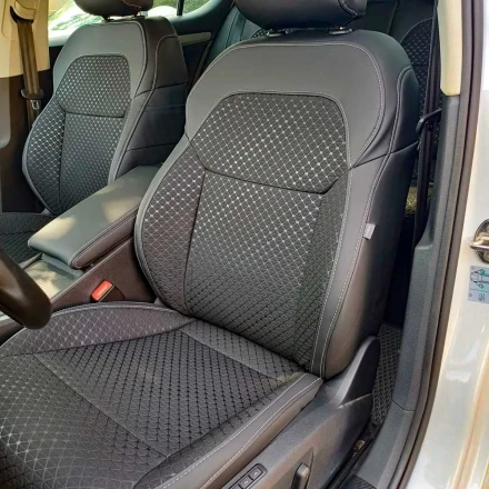 Чехлы на Skoda SuperB III (Шкода Суперб) из экокожи и ткани с тиснением