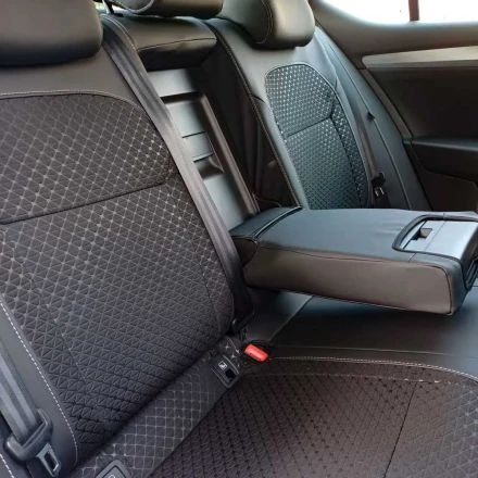 Чехлы на Skoda SuperB III (Шкода Суперб) из экокожи и ткани с тиснением